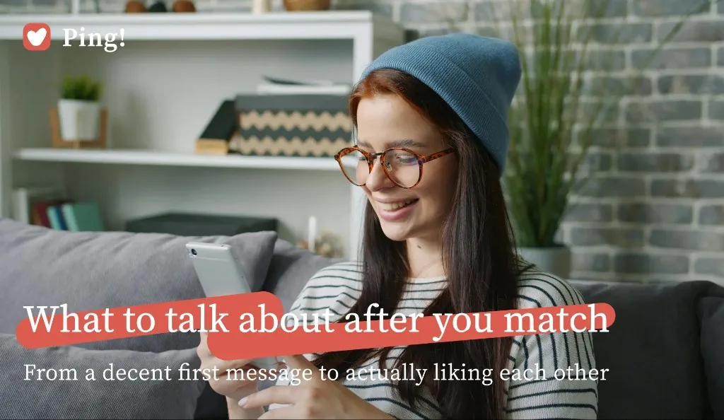 A woman smiling at her phone after matching, with the headline What to talk about after you match